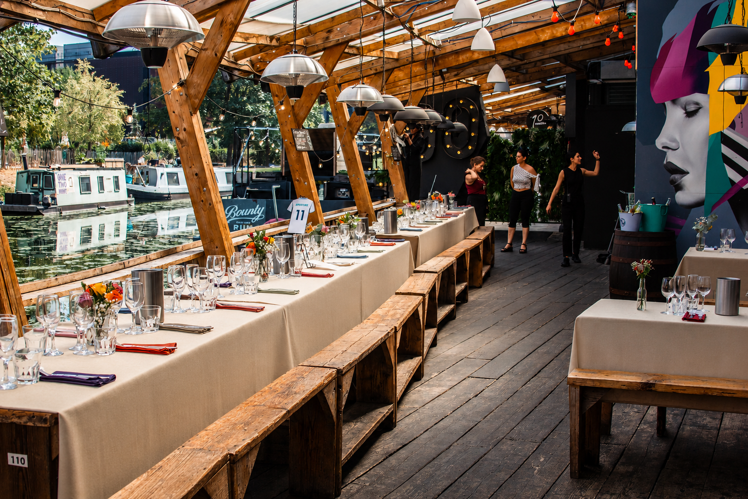 Canal-side wedding reception dining setup at Number 90, a creative London wedding venue with personality in Hackney Wick.